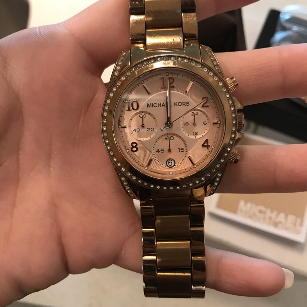Woman’s rose gold Michael Kors watch - MC5263
